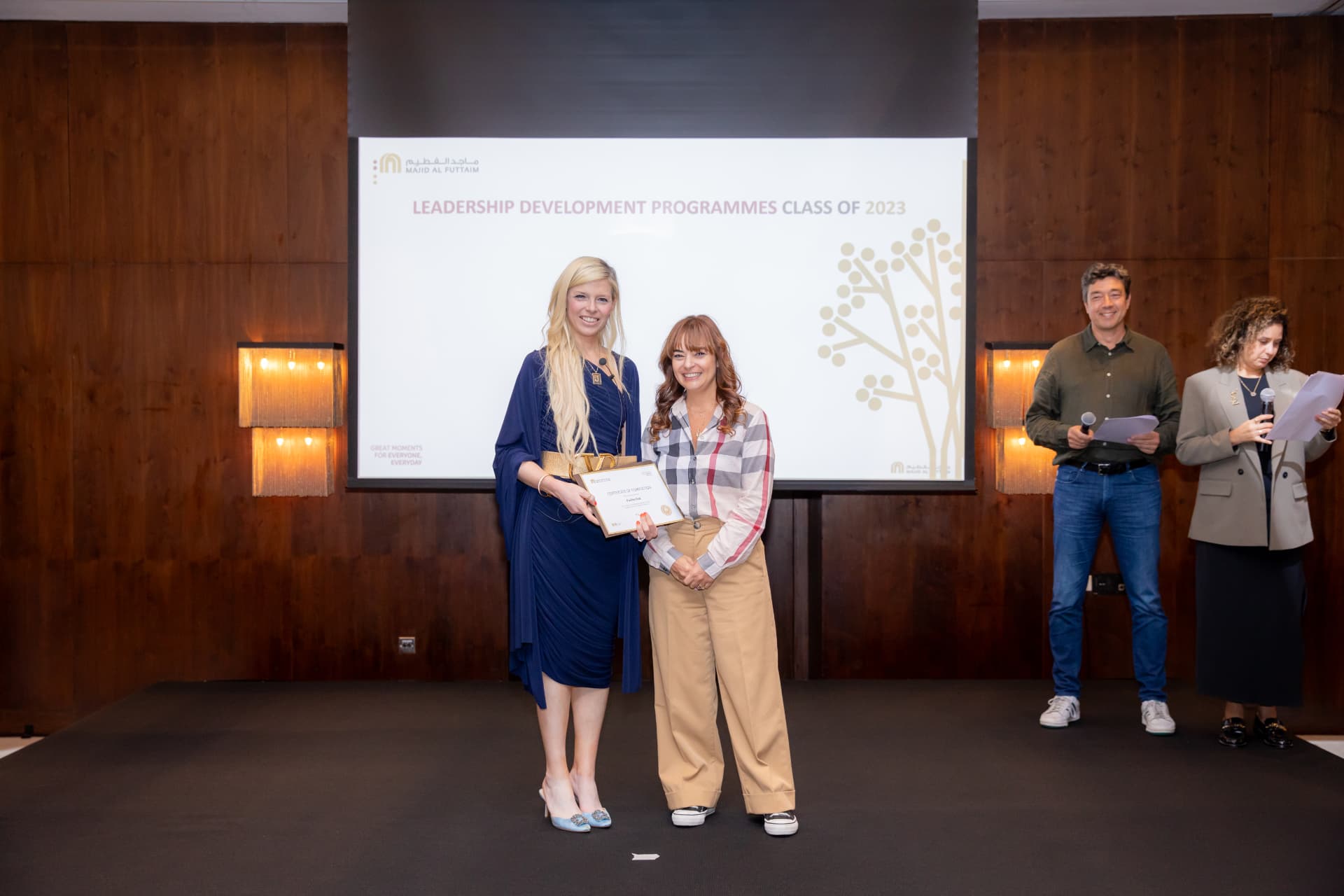 Dr Jojo receiving an award at the Majid Al Futtaim Leadership Development Programmes ceremony