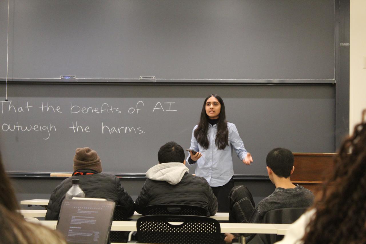Student presenting AI debate